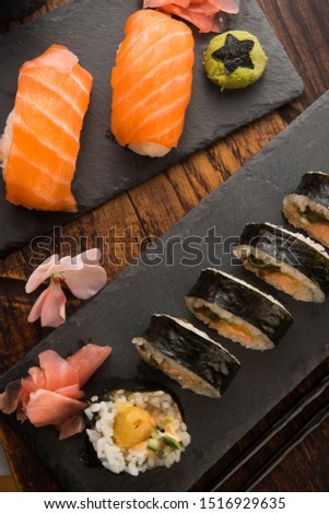 Foto stock: A Plate Of Different Combination Of Sushi With A Bowl Of Soba