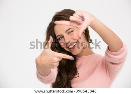Stock fotó: Young Woman Making Frame With Fingers