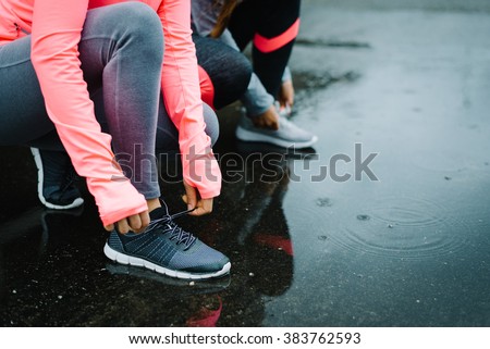 Stock photo: Women Ready For Running And Training Under The Rain