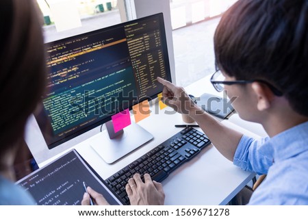 ストックフォト: Pensive Programmer Working On Desktop Pc Programming Code Techno