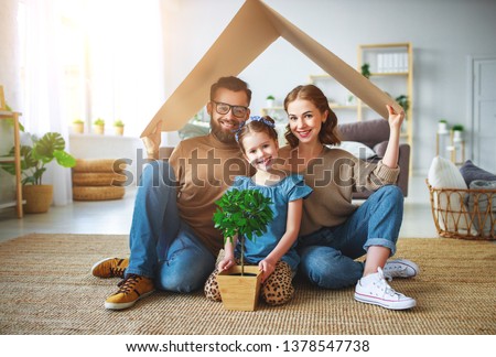 Foto stock: Family Home Concept With Model House And People On White Backgro