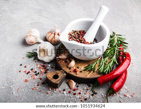 Herbs And Spices With Mortar And Pestle Foto stock © almaje