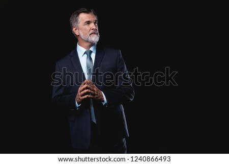 [[stock_photo]]: Portrait Of Confident Handsome Ambitious Smiling Elegant Responsible Businessman With Thumb Up On Bl