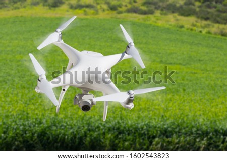 Foto d'archivio: Drone Unmanned Aircraft Flying And Gathering Data Over Country F