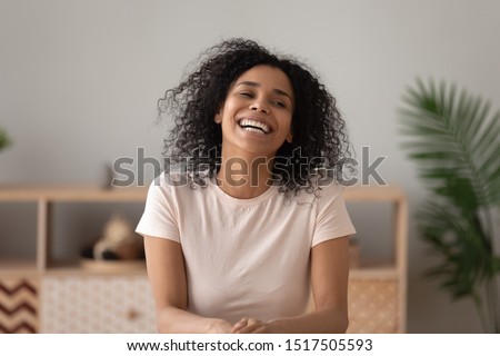 Stock fotó: Pleasant Looking Young Woman Has Toothy Smile Happy Face Expression Laughs At Something Funny Sho