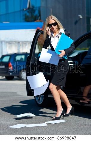 Stock fotó: Young Woman Business Lady In The Parking Lot Near The Business Center