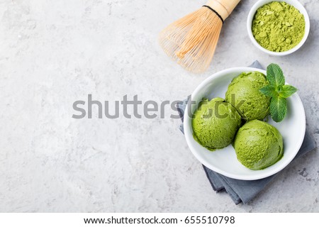 Stok fotoğraf: Green Tea Matcha Ice Cream Scoop In White Bowl On A Grey Stone Background