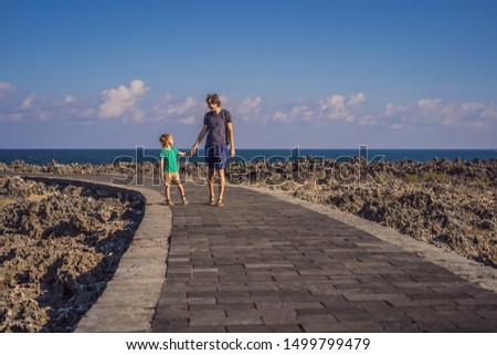 Zdjęcia stock: Father And Son Travelers On Amazing Nusadua Waterbloom Fountain Bali Island Indonesia Traveling W