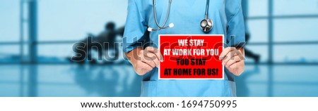 Covid 19 Social Distancing Quote Medical Nurse Promoting Staying At Home To Help Workers Coronaviru Zdjęcia stock © Maridav