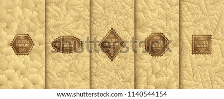 Gift Box In Gold Wrapping Paper With Autumn Leaves On The Abstra Foto stock © klerik78