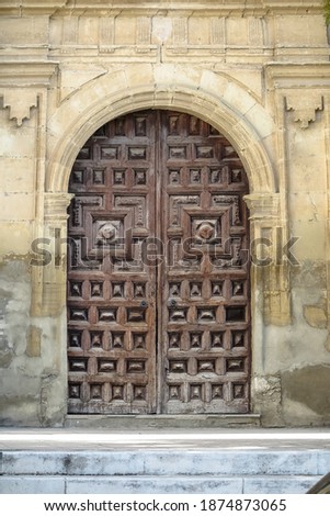 [[stock_photo]]: Closed Door Of A Building In The Medieval Town Of San Gimignano