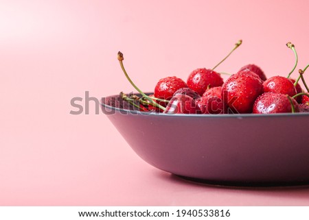 Foto stock: Fresh Ripe Black Cherries On A Blue Stone Background Top View Copy Space