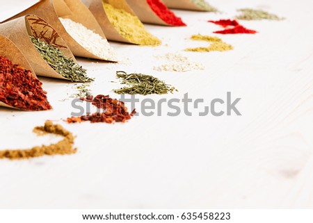 Stockfoto: Oriental Colorful Powder Condiments Pattern As Decorative Border On White Wooden Board With Copy Spa