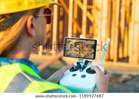 Stock photo: Unmanned Aircraft System Uav Quadcopter Drone In The Air Above