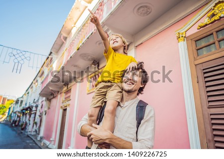Foto stock: Man Tourist On The Street In The Portugese Style Romani In Phuket Town Also Called Chinatown Or The
