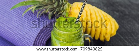 Stock fotó: Banner Green Smoothies Made Of Spinach And Pineapple And A Yoga Mat Healthy Eating And Sports Conce