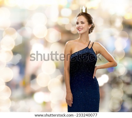 Zdjęcia stock: Beautiful Young Woman In Fashion Golden Dress Over Holiday Light