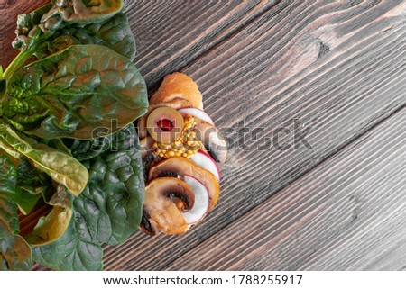 Сток-фото: Homemade Bruschetta With Slices Of Radish Spinach Leaf And Cottage Cheese With Flax Seeds On A Wood