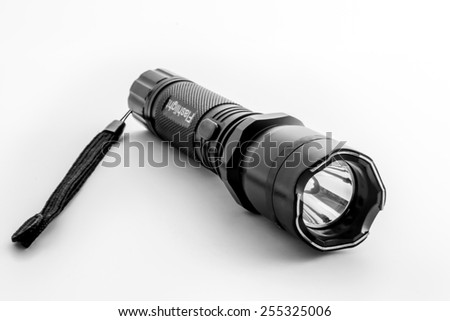 [[stock_photo]]: Hand Flashlight With Battery Isolated On White Background Vector Cartoon Close Up Illustration