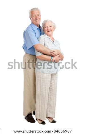 Foto stock: Portrait Of A Beautiful Elderly Couple Standing Embracing Outdoors