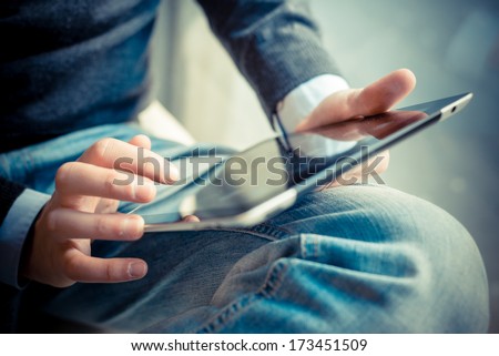 Stock fotó: Close Up Of Businessman Using Tablet Computer And Smart Phone To