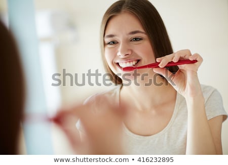 Stok fotoğraf: Beautiful Woman Brushing Teeth
