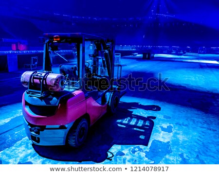 Foto stock: Yellow Fork Lift Truck Unloads Cargo Container