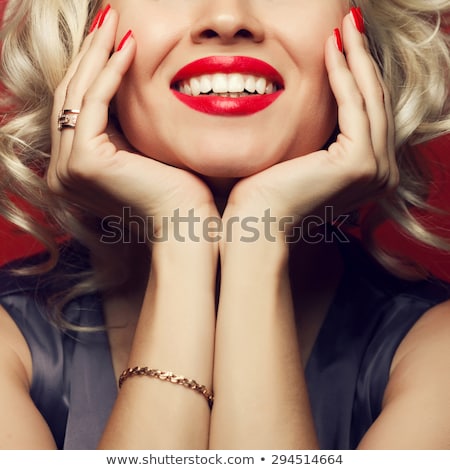 Smiling Beautiful Blond Woman Wearing Makeup Stock photo © Augustino