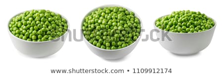 ストックフォト: Pea Pod In Bowl On A White Background