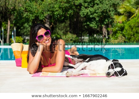 Stock fotó: Girl With Dog By Pool