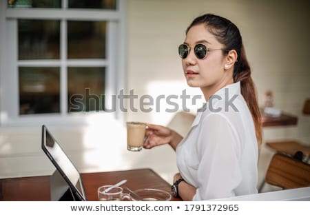 Zdjęcia stock: Young Woman Sitting And Thinking