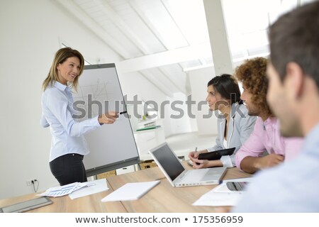 Foto stock: Blonde Woman Doing Business Presentation