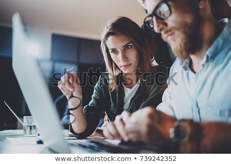 Stock photo: Young Girl In Office Working With Computer And Documents