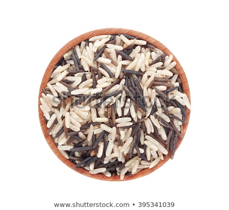 Foto stock: Black Bowl Of Raw Organic Basmati Long Grain And Wild Rice On White Background Healthy Food
