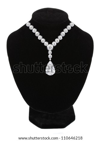 Foto d'archivio: Diamond Necklace On Black Mannequin Isolated On White Background