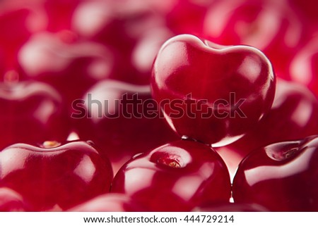Stockfoto: Cherry Background With Cherry In Form Of Heart Ripe Fresh Rich Cherries With Drops Of Water Macro