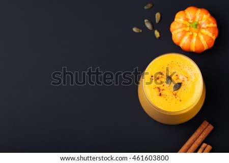 Stock photo: Pumpkin Smoothie With Pumpkin Pie Spices On A Black Slate Stone Background Top View Copy Space