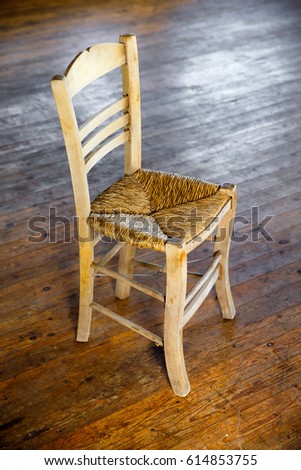 Stock fotó: Traditional Cane Seat Chair In The Sun Shadow On Old Wood Floor