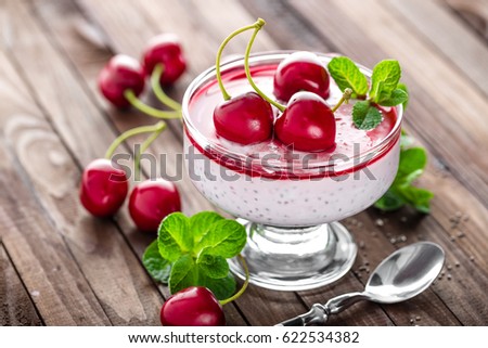 Stok fotoğraf: Fresh Yogurt With Cherry And Chia Seeds Delicious Dessert For Healthy Breakfast