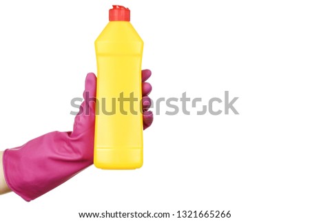 Zdjęcia stock: Female Cleaner With Yellow Gloves Holding A Bottle