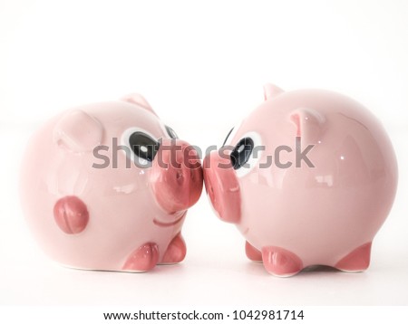 Stock fotó: Two Piggy Bank Kissing Each Other