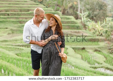 ストックフォト: Young Man Traveler On Beautiful Jatiluwih Rice Terraces Against The Background Of Famous Volcanoes I