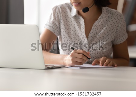 Foto stock: Close Up Of Businesswoman Using Digital Laptop Preparing Invoice