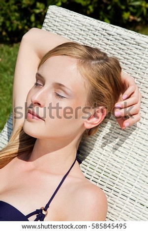 Stock photo: Young Woman Sleeping On Sun Lounger Close Up