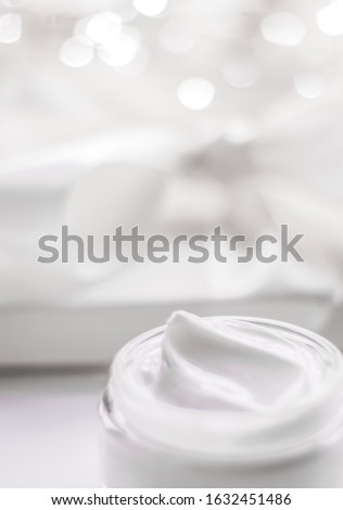 Foto stock: Facial Cream Moisturizer Jar On Holiday Glitter Background Mois