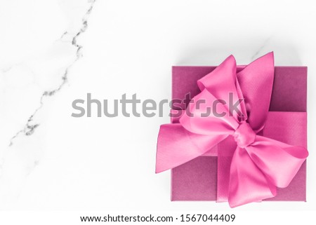 Zdjęcia stock: Pink Silk Ribbon And Bow On Marble Background Girl Baby Shower