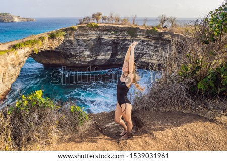 Stock fotó: Young Woman Tourist Near Broken Beach In Nusa Penida Indonesia Angels Billabong Beach Popular Tou