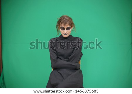 Stock foto: Pretty Brunette Woman With Make Up Like Demon At Halloween Dark Scary Look For Holiday Celebration