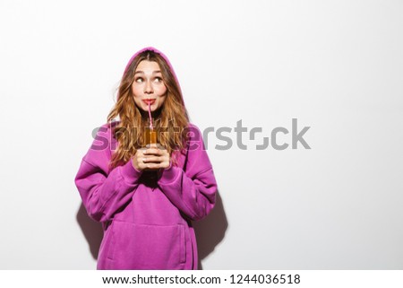 Foto stock: Portrait Of Joyous Woman 20s Wearing Sweatshirt Drinking Soda Us