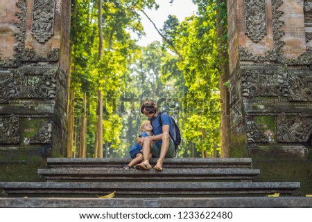 Stockfoto: Dad And Son Travelers Discovering Ubud Forest In Monkey Forest Bali Indonesia Traveling With Child